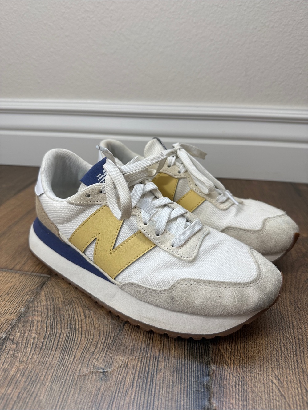 NEW BALANCE 237 White Sneakers with Yellow and Blue Accents